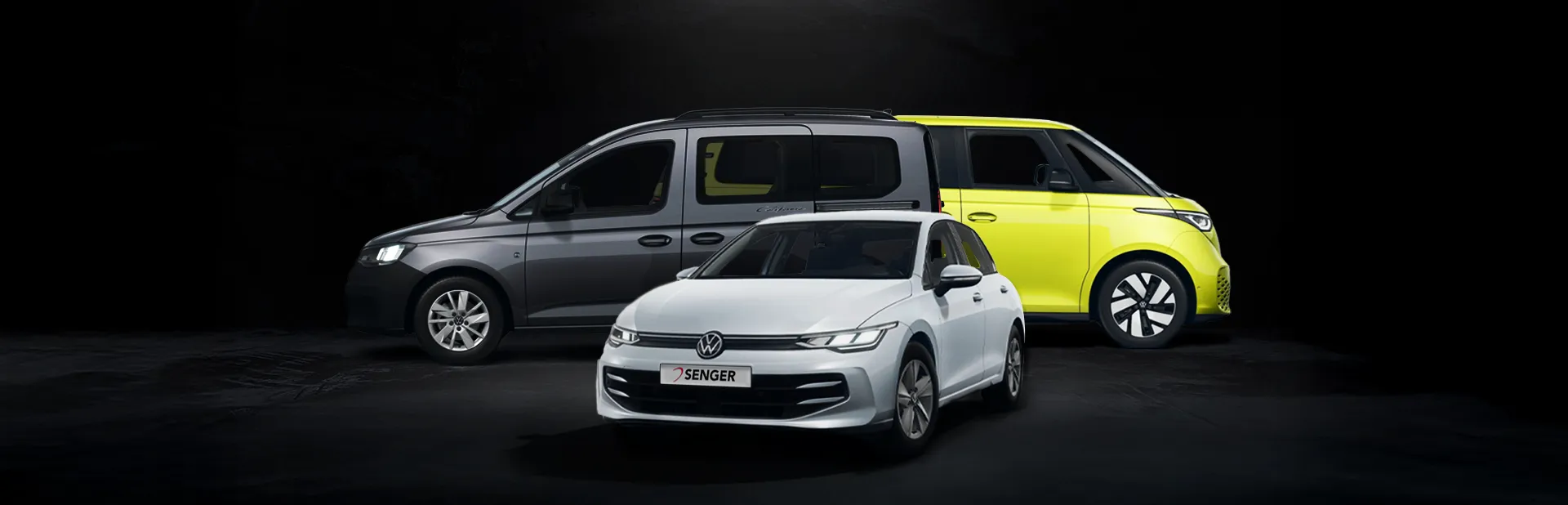 Eine Range von Volkswagen Modellen: Links der VW Caddy California, in der Mitte der VW Golf und rechts der VW ID. Buzz.